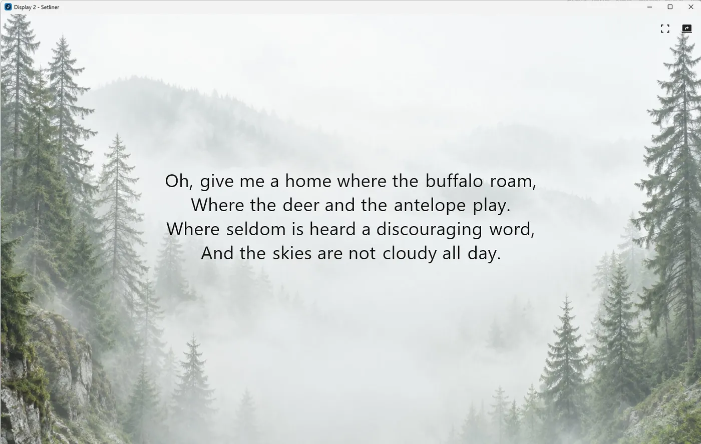 A pop-out display window showing one verse of lyrics, centred, over a misty forest background